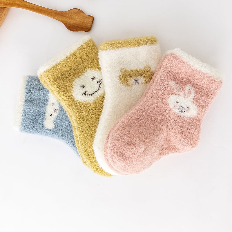 Шерстяні дитячі шкарпетки з тормозками на стопах
